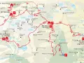 Mappa del Parco Nazionale dello Stelvio con sentieri per escursioni. Percorsi segnati in rosso, rifugi e cime evidenziati.